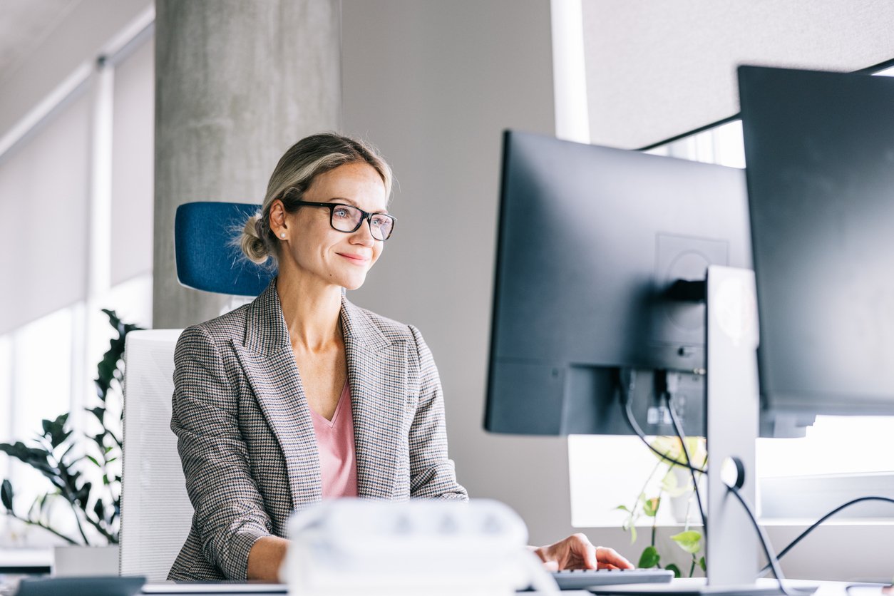 image of accounts payable employee working at her computer