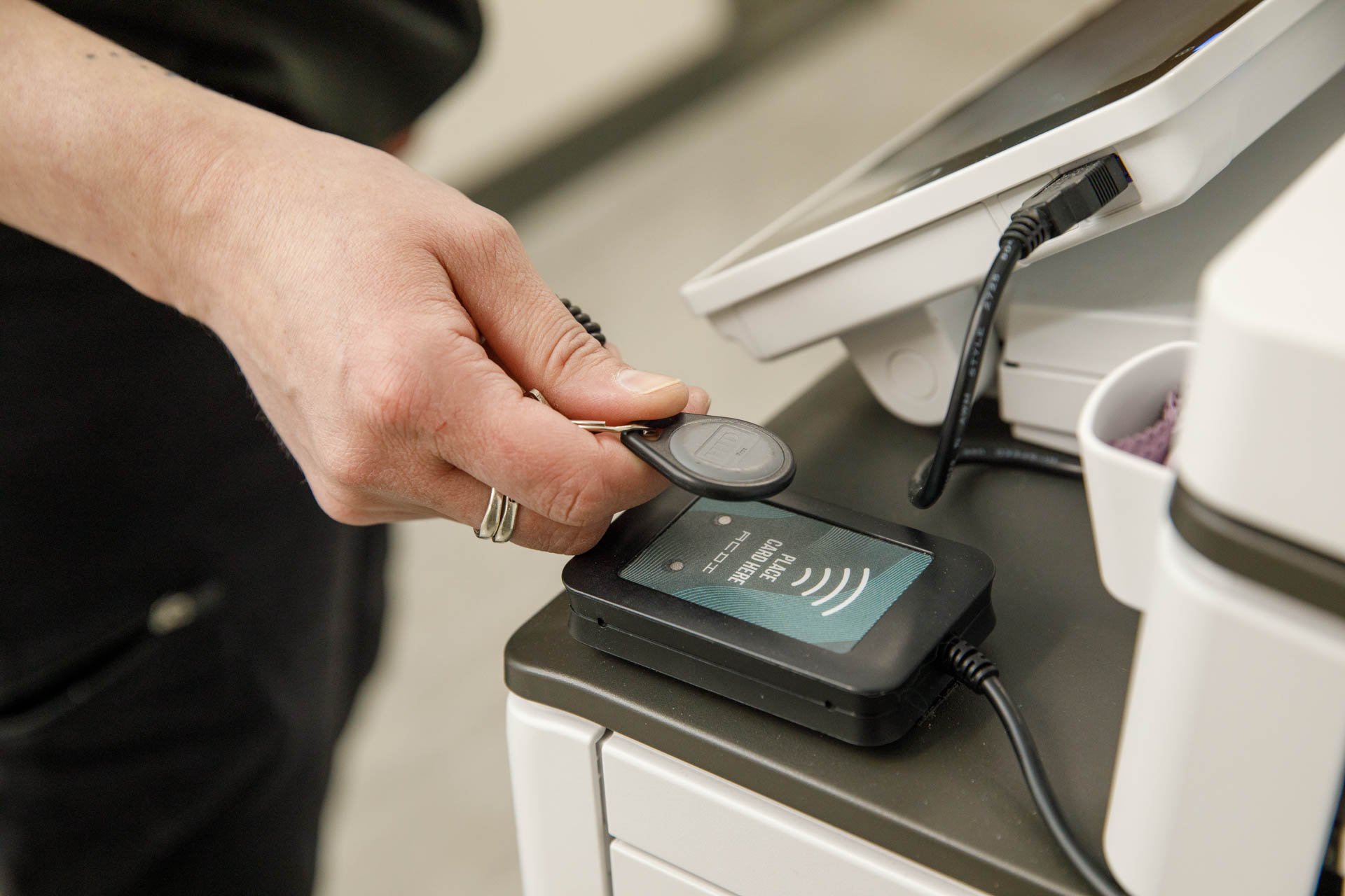 an image of a printer being accessed securely using a fob authentication protocol