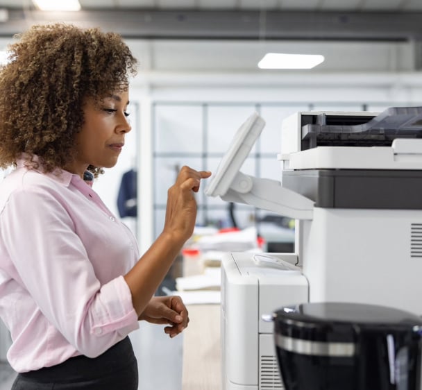 image of employee using cloud fax services in an office environment